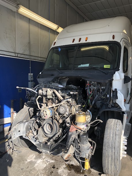 Truck Repair near Turnpike Exit 4 - Opening Front Part for Maintenance