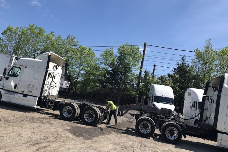 Inspecting Heavy Towing Truck - Truck Repair near Turnpike Exit 4